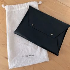 Nwot Genuine Leather Envelope Clutch With A Simple And Elegant Design. It Has Silver-Tone Push Through Clasps And An Understated Silhouette , Gives Modern And Timeless. Perfect Size For Everyday Essentials And Comes With Dust Bag. Size 9”X6” Black Envelope Shoulder Bag For Everyday Use, Black Envelope Bag For Everyday, Black Everyday Envelope Bag, Black Office Clutch With Magnetic Closure, Modern Black Clutch For Workwear, Black Envelope Shoulder Bag For Office, Black Clutch With Removable Pouch For Work, Black Envelope Pouch For Everyday Use, Chic Envelope Travel Pouch