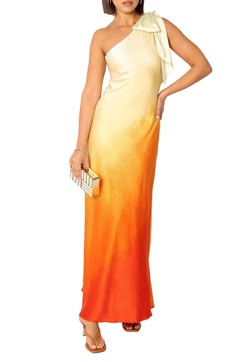 Ethereal swirls emulate flames on this head-turning ombré maxi dress accented with an oversized bow on the shoulder. Hidden side-zip closure One-shoulder neck Sleeveless Lined 100% polyester Hand wash, line dry Imported Orange Bridesmaids Dress, Sunset Bridesmaid Dresses, Gradient Dress, One Shoulder Dresses, 2024 Clothes, Sunset Dress, Fashion Dresses For Women, Wedding Sunset, Ombre Maxi Dress