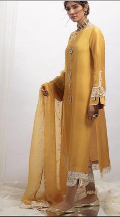 Buy Indian Designer Silk Mustard Yellow Kurta Pant Mustard Kurta online on Etsy India. Shop for handmade, vintage and unique Womens Dresses items from Classicwearboutique online on Etsy Wedding Palazzo Set In Yellow Chanderi, Elegant Yellow Palazzo Set With Traditional Drape, Yellow Silk Palazzo Set For Wedding, Wedding Yellow Chanderi Palazzo Set, Wedding Sharara With Gota Work And Long Sleeves, Wedding Yellow Palazzo Set With Straight Kurta, Yellow Chanderi Palazzo Set For Wedding, Elegant Yellow Palazzo Set For Eid, Long Sleeve Unstitched Suit With Gota Work For Eid