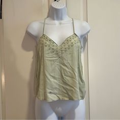 American Eagle Size Xs Very Pretty Pale Green Flowy Tank. Stitched Flower Design On Top. Adjustable Straps. Never Worn Before, Comes With Tags Green Cotton Camisole For Vacation, Green Summer Camisole Top, Green Cami Blouse For Spring, Green Camisole Top For Summer, Spring Green Cotton Camisole, Cotton Camisole Top For Vacation, Cotton Cami Top For Vacation, Green Cami Top For Spring, Green Cami Top For Day Out