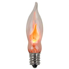 a light bulb that has been turned on and is lit up with an orange flame