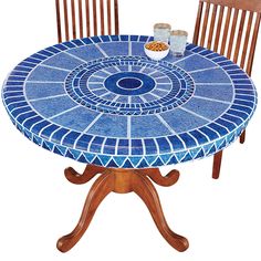 a blue table with chairs around it