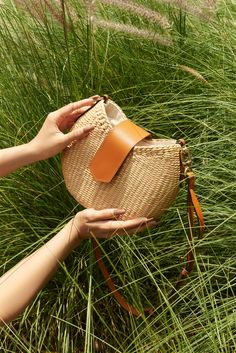 ✔️ UNIQUE, LUXURY DESIGN: Just pay a small part to get the most versatile, completely new and unique design, easy luxury handbags - clutch bags - bags made from natural water hyacinth fibers, Made by skillful and professional Vietnamese artisans from the famous Nga Son village, Thanh Hoa, Vietnam. ✔️ GREAT QUALITY GENUINE AND NATURAL LEATHER: We are proud to use the finest Vietnamese water hyacinth material available along with genuine, durable leather imported from Italy for the shoulder straps and front pockets. To us, quality is the most important thing. ✔️ GREAT USE: The inside of the VIVI bag is completely lined with canvas. We also use a handy drawstring to ensure your privacy in this great belt for women. ✔️ SIZE: 9.05"(23cm) x "3.14(8cm) x H7.48"(19cm). ✔️ MATERIAL: natural water h Everyday Straw Bag Pouch With Detachable Strap, Everyday Straw Pouch Bag With Detachable Strap, Versatile Natural Bag With Detachable Strap, Modern Straw Bag With Removable Pouch For Summer, Modern Shoulder Bag With Removable Pouch For Vacation, Natural Handheld Straw Bag With Mobile Phone Holder, Everyday Natural Straw Bag With Mobile Phone Holder, Natural Satchel Bucket Bag With Mobile Phone Bag, Natural Satchel Bucket Bag With Mobile Phone Holder