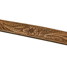 "Truly a work of art, these belts are made by hand in a female-owned factory in Mexico. After being cut to size each one hand-tooled one by one using patterns from the family's archives.??�---Kenshawn Details 100% leather, lightly conditioned; color will darken over time Hand-tooled flower and leaf motif Made by hand in Mexico Size & Fit Belt sizes: order one or two size larger than your typical waist size, depending on how long you want the belt to hang Tooled Leather Belts, Umbrella Shop, Maker Shop, Leaf Motif, Hand Tooled Leather, Marine Blue, Tooled Leather, Pocket Pants, Western Shirts