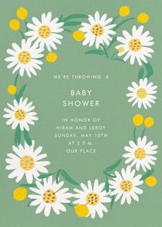 a baby shower card with daisies in the center