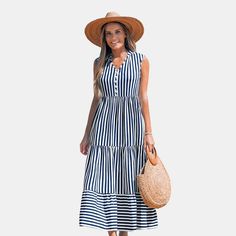 Make a statement in our Striped Tiered Ruffled Maxi Dress. With its tiered ruffle design, it's the perfect blend of fun and sophisticated for any summer occasion. Whether you're attending a glamorous event or simply enjoying a casual day out, this dress will keep you feeling confident, stylish, and perfectly in tune with the vibrant energy of the season. Product code: CAA05A4E204TC Casual Tiered Mini Dress For Garden Party, Tiered Summer Dress For Vacation, Tiered Summer Vacation Dresses, Summer Tiered Maxi Dress For Beach Season, Tiered Ruffle Hem Dress For Picnic, Fitted Tiered Dress For Summer Garden Party, Summer Picnic Maxi Dress With Ruffles, Summer Maxi Dress With Ruffles For Picnic, Ruffled Sundress Maxi For Picnic