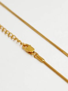 Indulge in pure sophistication with our Dainty Herringbone Necklace. Crafted with 18k gold vermeil, it's the perfect everyday accessory for elevating any outfit. Experience luxury and elegance with every wear. Adjustable Classic Yellow Gold Chain Necklace, Classic Adjustable Yellow Gold Chain Necklace, Classic Gold Necklace With Snake Chain, Classic Adjustable Gold Necklaces, Classic Adjustable Gold Necklace, Gold Box Chain Necklace For Everyday Luxury, Classic Gold Plated Snake Chain Necklace, Timeless Gold Snake Chain Necklace, Herringbone Necklace