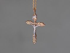 "*Saint Michael's jewelry is all hand-made. Please note that each piece of jewelry is specially hand-made when you order and will take production time described below before being despatched.* Arvo Cross Necklace is a piece inspired by antique cross pendants we have gathered from years ago. The delicate carving of the symbolic olive tree and Christ makes the overall necklace a beautiful piece. The olive branch is the symbol of peace, rebirth, and love. This origin from the Hebrew Bible where the Handmade Yellow Gold Crucifix Jewelry, The Olive Branch, Symbol Of Peace, Casual Necklaces, Hebrew Bible, Saint Michael, Pendant Necklace Gold, Gold Name Necklace, Gold Cross Necklace