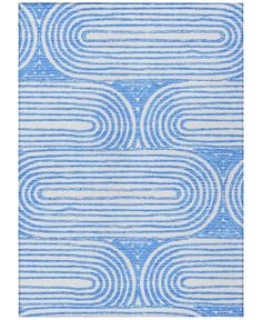 a blue and white rug with wavy lines