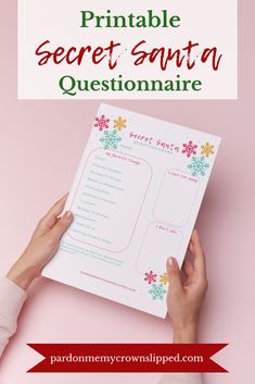 someone holding up a printable secret santa questionnaire