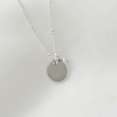 Express your unique personality with this Sterling Silver plated initial necklace that is both stylish and sentimental. The personalized initial charm sits elegantly between the collar bones, adding a polished touch to any outfit. To make this necklace even more special, it can be customised with a letter, heart or star sign of your choice. This adds a unique touch to the piece, making it a perfect gift for yourself or someone special. ♡ Handcrafted and Stamped in our Sydney Studio ♡  Natural Fr Letter Necklace Initials, Suede Jewelry, Personalised Necklace, Minimalist Gifts, Zodiac Necklaces, Pearl Charms, Star Sign, Letter Necklace, Initial Charm