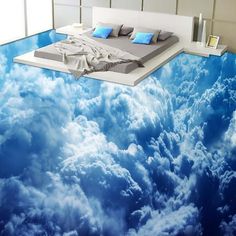 the floor is painted with blue clouds and white walls, as if it were floating in the air