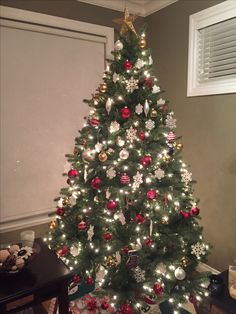 a decorated christmas tree in a living room