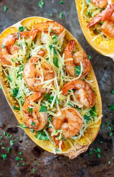 two squash halves filled with shrimp and pasta