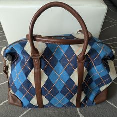 Beautiful, New Without Tags, Argyle Pattern Weekender Overnight Duffle Bag In Blue, Stone White, Navy With Touches Of Orange, Pleather /Vinyl Brown Handles, Zip Closure, Roomy Interior, Argyle Pattern, Blue Stone, Duffle Bag, Blue White, Handles, Bag Lady, Blue And White, Vinyl, Navy