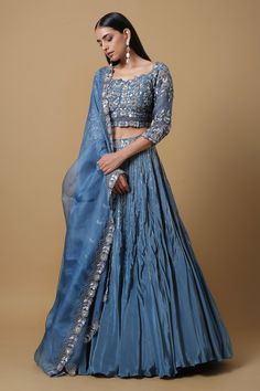 Yale blue embroidered lehenga in sequin work. Paired with floral embroidered choli and dupatta.
Component: 3
Pattern: Embroidered
Type Of Work: Sequins
Neckline: Square
Sleeve Type: Three quarter
Fabric: Organza, Crepe
Color: Blue
Other Details: 
Scallop dupatta
Floral embroidered lehenga yoke
Occasion: Wedding, Reception - Aza Fashions Blue Indian Dress, Scallop Dupatta, Yale Blue, Reception Outfit, Trendy Outfits Indian, Blue Organza, Hand Embroidery Dress, Gaun Fashion, Blue Lehenga