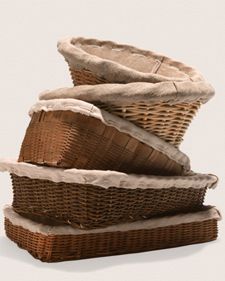 three wicker baskets stacked on top of each other