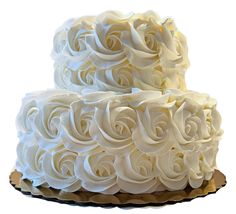 two tiered cake with white frosting roses on it's top and bottom