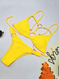 Sku CY-!42585 Material Nylon Lining Polyester Style Bralette , Padded Feature Backless , Solid Occasion Beach , Hot Springs , Swimming Pool Type Bikini Swimsuit Color FLOWER,YELLOW,BLACK,WHITE,FLUORESCENT GREEN Size S,M,L,XL Size Chart Please consult the size chart we provide for this item's measurements to help you decide which size to buy. Please note: There may be 1-3cm differ due to manual measurement. CMINCH Bust Waist Hips S 84-88 68-74 78-94 M 88-92 74-78 82-98 L 92-96 78-82 86-102 XL 96- Yellow T-back Swimwear For Beach Season, Yellow Backless Swimwear For Spring, Yellow Backless Swimwear For Sunbathing, Yellow Strappy Swimwear For Poolside, Yellow Backless Swimwear For Party, Yellow T-back Swimwear For Summer, Yellow Strappy Swimwear For Beach, Yellow Backless Swimwear For Poolside, Yellow Strappy Swimwear For The Beach