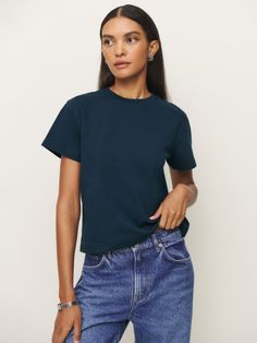 Shop the Rowan Crew Tee from Reformation, a relaxed, short-sleeve crewneck tee. Boxy Fit Crew Neck T-shirt For Summer, Summer Boxy Fit Crew Neck T-shirt, Cotton Boxy Fit Short Sleeve Crew Neck Top, Cotton Boxy Fit Short Sleeve Top With Crew Neck, Boxy Fit Cotton Short Sleeve Crew Neck Top, Boxy Fit Cotton Short Sleeve Top With Crew Neck, Boxy Fit Short Sleeve Cotton Top With Crew Neck, Organic Cotton Boxy Fit T-shirt With Crew Neck, Relaxed Fit Organic Cotton Short Sleeve Tops