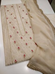 Item Overview ATHARVA Hand Embroidery Salwar Kameez Beige/Chiffon Dupatta With Stone & Trim/Custom Stitch Unstitch/Gift/Patiala/Anarkali/Churridar/ Dno. CH1732 Fabric: * Shirt: Chanderi Silk- Embroidered Neck/ 2.5 Mts Beautiful Hand Embroidery * Dupatta: Chiffon Chinnon Dupatta/Stone all over/4 Side trims/ Latkan tassels * Bottom Santoon Silk 2.5 Mts. Excusive Hand Embroidered Party Wear Punjabi Suit. Customization: * Fabrics Customization: Designs Can be made in different Fabrics. *Color Custom Latkan Tassels, Embroidery Dupatta, Bridal Mehndi Dresses, Mehndi Dresses, Gota Work, Womens Trendy Dresses, Embroidery Tshirt, Pakistani Fashion Party Wear, Embroidery Sweater