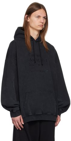 French terry hoodie. · Drawstring and embroidered logo at hood · Text embroidered at front · Kangaroo pocket · Rib knit hem and cuffs · Dropped shoulders · Graphic and text at back Supplier color: Blackout Relaxed Fit Hoodie With Embroidered Logo For Streetwear, Black Cotton Hoodie With Embroidered Logo, Winter Hoodie With Embroidered Logo And Relaxed Fit, Oversized Hooded Sweatshirt With Embroidered Logo, Oversized Hooded Hoodie With Embroidered Logo, Oversized Cotton Hoodie With Embroidered Logo, Oversized Hoodie With Embroidered Logo For Winter, Oversized Winter Hoodie With Embroidered Logo, Winter Cotton Hoodie With Embroidered Logo