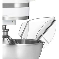 a large metal bowl with a glass cover on it's side and a mixer attachment in the middle