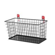 a metal basket with two red handles on the bottom and one black shelf below it