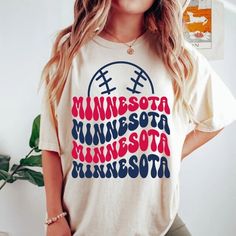 "Comfort Colors Minnesota Baseball Shirt, Minnesota Baseball Sweatshirt, Vintage Style Minnesota Baseball shirt, Minnesota Baseball fan Gift -Please check Color and Size Charts before placing the order. You can find them in the listing's photos (Depending on what device you are viewing this listing colors may vary slightly). -Returns and exchanges are accepted only if there are defects \"No Extra Costs\" We create custom t-shirts with great designs for everyone's liking. If you don't find the size or color you would like, please message us and we will be happy to  accommodate! Comfort Colors Minnesota Baseball Shirt, Minnesota Baseball Sweatshirt, Vintage Style Minnesota Baseball shirt, Minnesota Baseball fan Gift PRODUCT T-shirt Comfort Colors® 1717     Medium fabric (6.1 oz/yd² (206.8 g/ Minnesota Twins Baseball, Baseball Sweatshirts, Twins Baseball, Baseball Outfit, Minnesota Twins, Baseball Fan, Credit Card Debit, Baseball Shirts, Baseball Tshirts