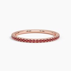 Luxe Ballad Garnet Ring - 14K Rose Gold. This petite ring features scalloped pavé garnets in elegantly sculpted prongs that extend three-fourths of the way around the band, leaving a small sizing bar in back. Elegant Ruby Eternity Band, Elegant Ruby Gemstone Eternity Band, Elegant Ruby Stackable Rings With Round Band, Elegant Yellow Gold Ruby Eternity Band, Elegant Half Eternity Ruby Ring For Formal Occasions, Elegant 14k Gold Ruby Ring With Half Eternity Design, Elegant Ruby Eternity Band In Yellow Gold, Elegant Red Stackable Eternity Band, Elegant Stackable Ruby Ring For Formal Occasions