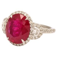 7.18 carat Certified Burma Ruby Set in a custom platinum and diamond mounting featuring 1.01 carats of white round and half moon cut diamonds. A fabulous ring with exceptional color. Currently a size 6, this ring can easily be sized to any finger size. Certified by GRS of Switzerland - certificate available on request for serious inquiries. Moon Cut, Ruby Set, Ruby And Diamond Ring, Ruby Diamond Rings, Fashion Icons, Ruby Diamond, Ring Ring, Half Moon, Cocktail Rings