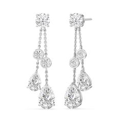 The tear-shaped diamonds are known for their graceful and elongated shape, which creates a sense of elegance and movement in the earrings.These earrings are designed to capture attention and add a touch of sophistication and radiance to your ensemble. Diamond Cut Teardrop Chandelier Earrings, Timeless Teardrop Diamond Earrings For Evening, Teardrop Diamond Cut Bridal Earrings For Evening, White Diamond-cut Teardrop Earrings, White Diamond Cut Teardrop Earrings, Teardrop Diamond Cut Bridal Earrings, White Gold Teardrop Chandelier Earrings Fine Jewelry, Elegant Teardrop Diamond Cut Chandelier Earrings, White Gold Teardrop Chandelier Earrings