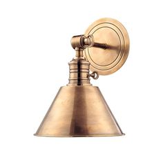 an antique brass wall light with a white background