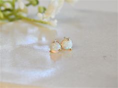 Opal Earrings, Gold Stud Earrings, Gift for Her, Earrings for Women, Bridesmaid Earrings, Lightweight White Gemstone Trendy Earrings Hypoallergenic: The earring posts and clasps are made from hypoallergenic materials, making them suitable for sensitive ears and reducing the risk of irritation. Meaningful Gift: Opals are often associated with love, hope, and inspiration. These earrings make a meaningful gift for birthdays, anniversaries, or as a symbol of new beginnings and positive energy. Gift- Delicate Round Earrings For Anniversary, Adjustable Fine Jewelry Earrings For Anniversary, Delicate Round Anniversary Earrings, Anniversary Delicate Round Earrings, Delicate Round Earrings With Prong Setting, Nickel-free Fine Jewelry Earrings For Wedding, Dainty Prong Set Earrings As Gift, Nickel-free Wedding Earrings Fine Jewelry, Delicate Round Earrings For Gift