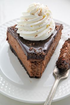 a piece of chocolate pie with whipped cream on top