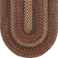 an oval rug with brown and red colors