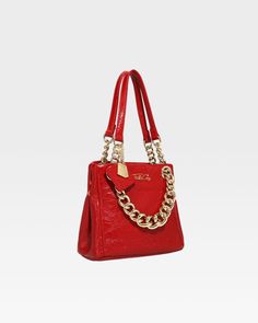 Elevate your style with our Luxurious Red Mini Tote Bag, crafted to add a touch of elegance and sophistication to your everyday ensemble reflecting a chic, modern aesthetic that captures attention wherever you go. Designed for the fashion-forward individual, it offers a perfect blend of style and functionality. Elegant Red Tote Shoulder Bag, Rolling Duffle Bag, Red Handheld Bags With Gold-tone Hardware, Nylon Travel Bag, Red Shoulder Bag With Gold-tone Hardware For Shopping, Modern Red Shoulder Bag With Gold-tone Hardware, Red Tote Bag With Gold-tone Hardware, Suitcase Set, Duffle Bag Travel