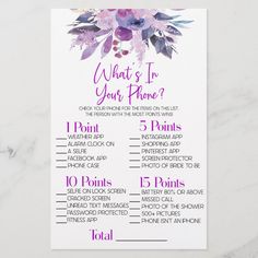 the wedding seating chart is shown with purple flowers and greenery on it's side