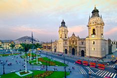 an aerial view of a city square at dusk