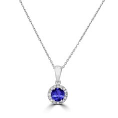 This luxurious pendant is perfect for adding a little sparkle to your look to catches the attention of the crowd. This 14K white gold pendant is creatively designed and set with round-cut Tanzanite and round-cut Diamonds to exude luxury. Product Information SKU J21448 Metal Type 14K Metal Color White Gold Primary Stone Gemstone Name Tanzanite Gemstone Species Zoisite No. Of Gemstones 1 Gemstone Shape Round Gemstone Color Blue Gemstone Grade AAAA Gemstone Clarity VVS Gemstone Weight 0.52 cts Gems Tanzanite Gemstone Round Pendant, Tanzanite Gemstone Round Pendant Jewelry, Sapphire Diamond Round Necklace, White Gold Round Tanzanite Necklaces, Dazzling Round Tanzanite Jewelry, Formal Birthstone Necklace With Diamond Accents, Formal White Gold Diamond Birthstone Necklace, Round Diamond Birthstone Necklace In Prong Setting, Round Diamond Birthstone Necklace With Prong Setting