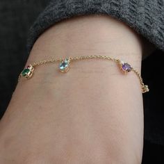 DescriptionGenuine Multi Color Gemstone & SI Clarity G-H Color Diamond Dainty Charm Station Chain Bracelet Solid 14K Yellow Gold Adjustable Jewelry≫ Features• Items Code: SGBR00215• Solid 14K Yellow Gold with stamped• 18K also available - Additional fees may apply)• More option in gold color: Rose gold, yellow gold, White gold• Diamonds Wt: 0.07 ct• Diamond color: G-H• Diamonds Clarity: SI• Diamonds Cut: Brilliant• Multi-Color Gemstone Wt:- 3.52 Ct.• Wrist Size:- 6.5 / 7 / 7.5 inches≫ FAQ be Jeweled Chain Bracelet Gift, Gift Jeweled Chain Bracelet, Dainty 14k Gold Gemstone Chain Bracelet, Dainty Gold Bracelet With Birthstone, Adjustable Jewelry, Diamond Charm, Fine Jewelry Gift, Diamond Color, Jewelry Gift Box