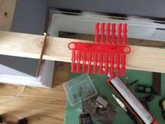 tools are sitting on top of a piece of wood