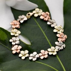 Tri-color 14K Gold Plumeria Bracelet with Diamonds or Cubic Zirconia Dresses Hawaii, Hawaii Souvenirs, Food Hawaii, Hawaiian Bracelets, Polynesian Cultural Center, Bracelet With Diamonds, Plumeria Flowers, Hawaiian Jewelry, Hawaiian Food