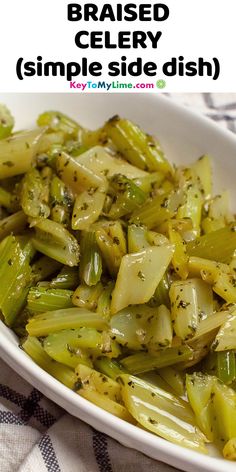 a white bowl filled with cooked celery on top of a checkered table cloth