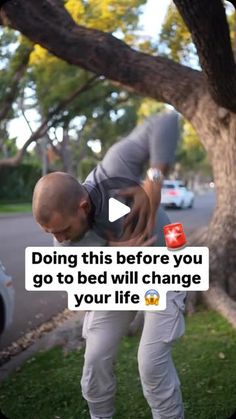 a man standing in front of a tree with his hands on his hips and the words doing this before you go to bed will change your life