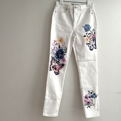 New Without Tags Condition. Super Soft & Stretchy High Waist. 28”-30” Waist, 31” Inseam, 11.5” Rise. White Floral Print Jeans For Spring, White Cotton Jeans With Floral Print, Medium Wash Cotton Jeans With Floral Embroidery, Casual White Jeans With Floral Print, White Floral Print Cotton Jeans, White Wide-leg Pants With Floral Embroidery, Floral Embroidered Jeans With Multicolor Detail, Embroidered Non-stretch Denim Pants, Ribbed Jeans