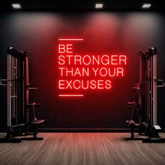 a red neon sign that says, be stronger than your exercises