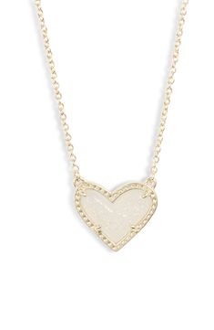 This whimsical pendant necklace charms with a colorful heart set in an etched metal frame. Style Name:Kendra Scott Ari Heart Pendant Necklace. Style Number: 5921868. Kender Scott Necklaces, Heart Necklace Kendra Scott, Pink Heart Kendra Scott, Kendra Scott White Heart Necklace, White Kendra Scott Necklace, Kendra Scott Heart Necklace, Kendra Scott Gold Heart Necklace, Kendra Scott Necklace On Person, Kendra Scott Heart Necklace Hot Pink