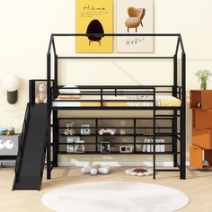 there is a bunk bed with a slide in the middle and bookshelf below