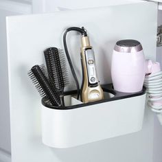 The 3-in-1 compartments of the hair tool organizer cabinet door can be organized to hold hair dryer, curling wands, hairbrushes, combs, razors or makeup tools well, making it easy to reach. keep your countertops area organized and clutter-free. The hair tool holder for hair dryer and curling iron fits inside the cabinet door or on the counter, saving you precious countertop space. Blow dryer and curling iron holder is not afraid of moisture or high temperature, made of high quality Acrylonitrile Hair Dryer And Straightener Holder, Hair Appliance Organization, Hair Supplies Organization, Diy Hair Dryer Holder, Hair Tool Holder, Straightener Holder, Hot Hair Tools, Curling Iron Holder, Curling Wands